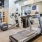 Fitness center at our apartments for rent in Deep Ellum, featuring treadmills and other exercise equipment.